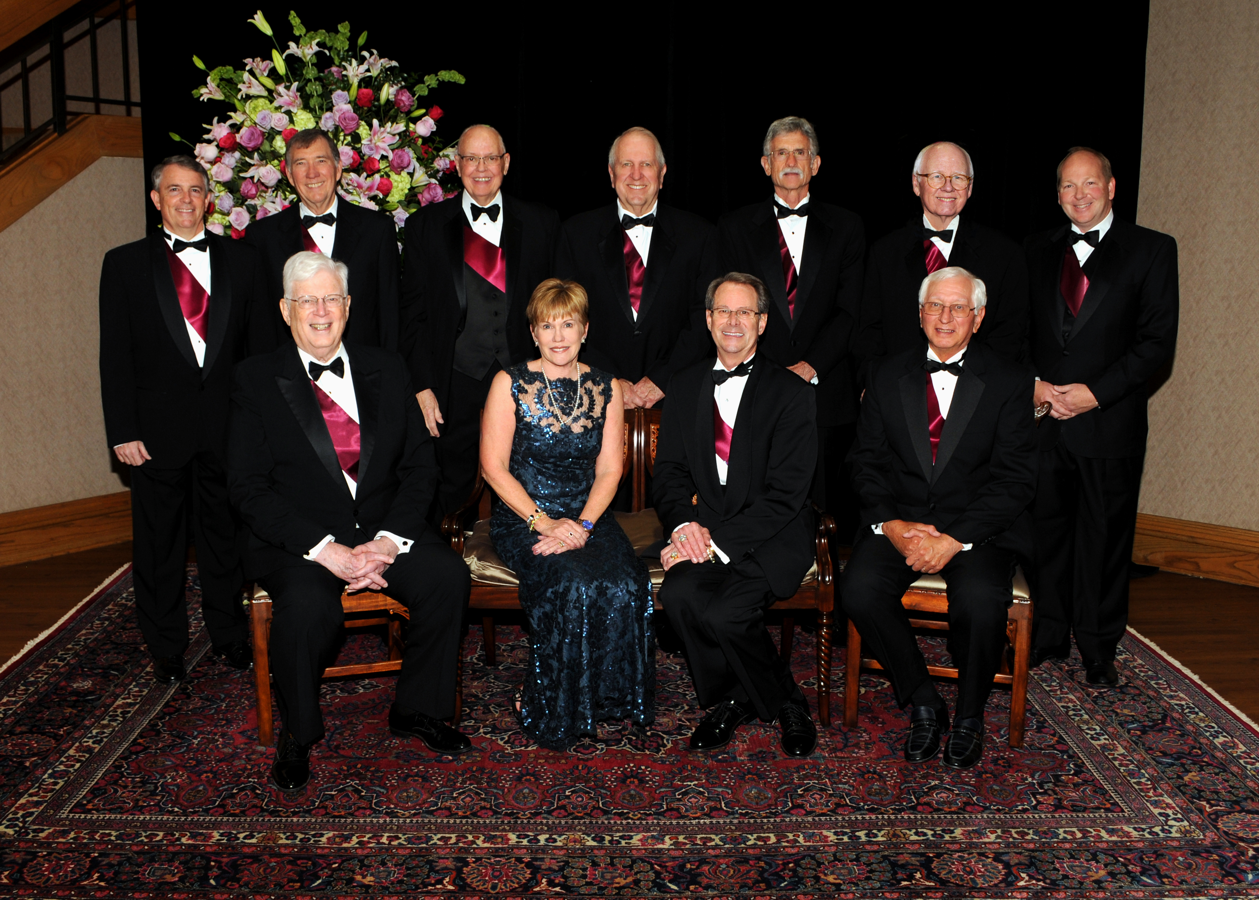 Symphony Ball Advisors: Row 1 (seated left to right) Dr. Steven Smith, Linda Akenhead (Ball Chair), Randy Roper, Dr. Doug Patz, | Row 2 (standing left to right) Warne Heath, Dr. John Cox, Dan Halcomb, John Switzer, Larry Thomas, Byrd Latham, Michael Timberlake 